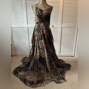 Elizabeth and James Brown and Black Backless Evening Gown